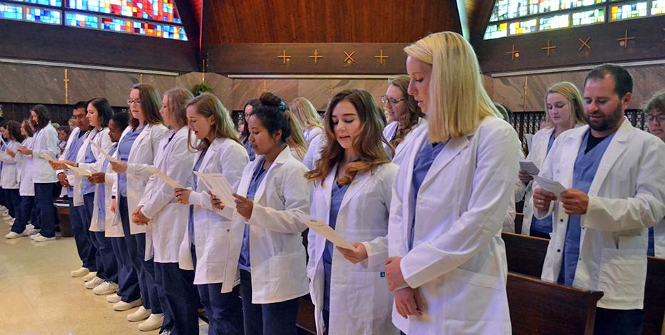 Students in their white coats during the white coat ceremony